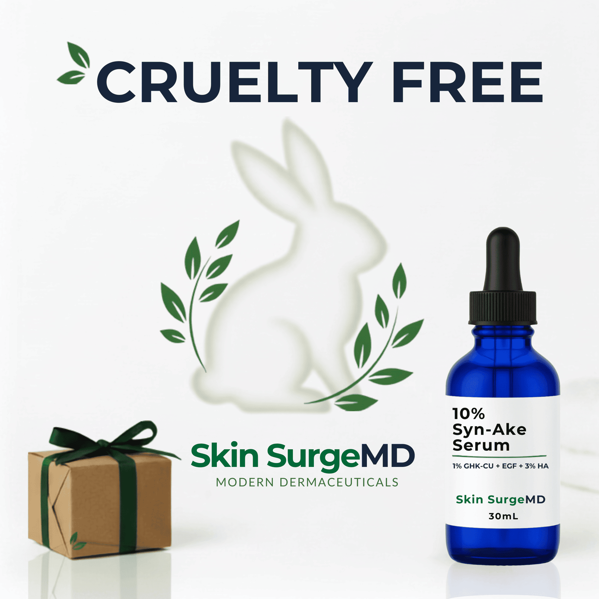 A blue glass dropper bottle of Skin SurgeMD 10% Syn-Ake Serum on a white background, alongside a small brown gift box with a black ribbon and a white rabbit silhouette with green leaves. Large text at the top reads 'CRUELTY FREE'.